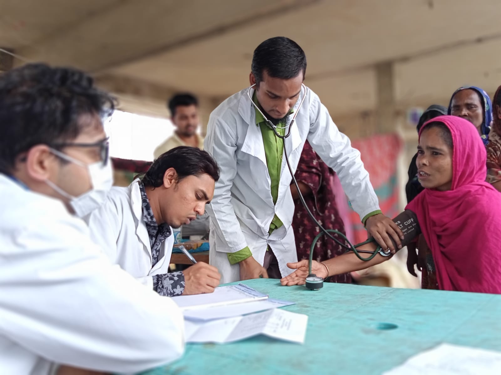 Flood Relief & Treatment by North East Medical College-Best Medical College and Hospital in Sylhet